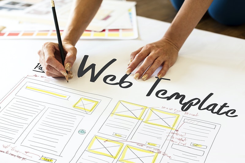HOA Website Templates: Making Website Creation Easy and Cheap 1 hoa website template - picture of a person writing web template