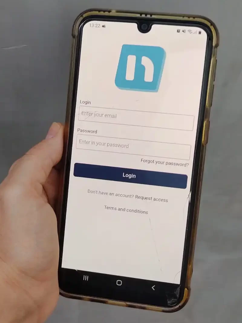 Boost Your Condo Association With Our Top 5 Solutions: Ultimate Guide to Condo Management Software 3 hand holding phone with neigbrs by vinteum app against a grey background