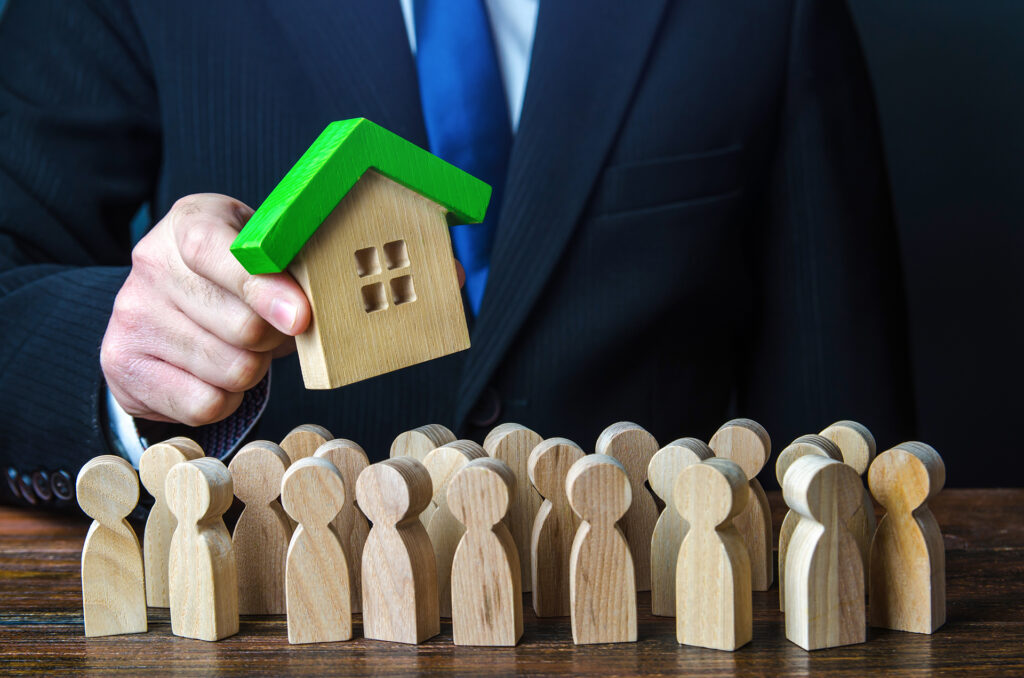 Community Toolkit: From Welcome Letters to Emergency Prep 1 a man holds a house above a crowd of people 2026 01 08 23 28 02 utc 1